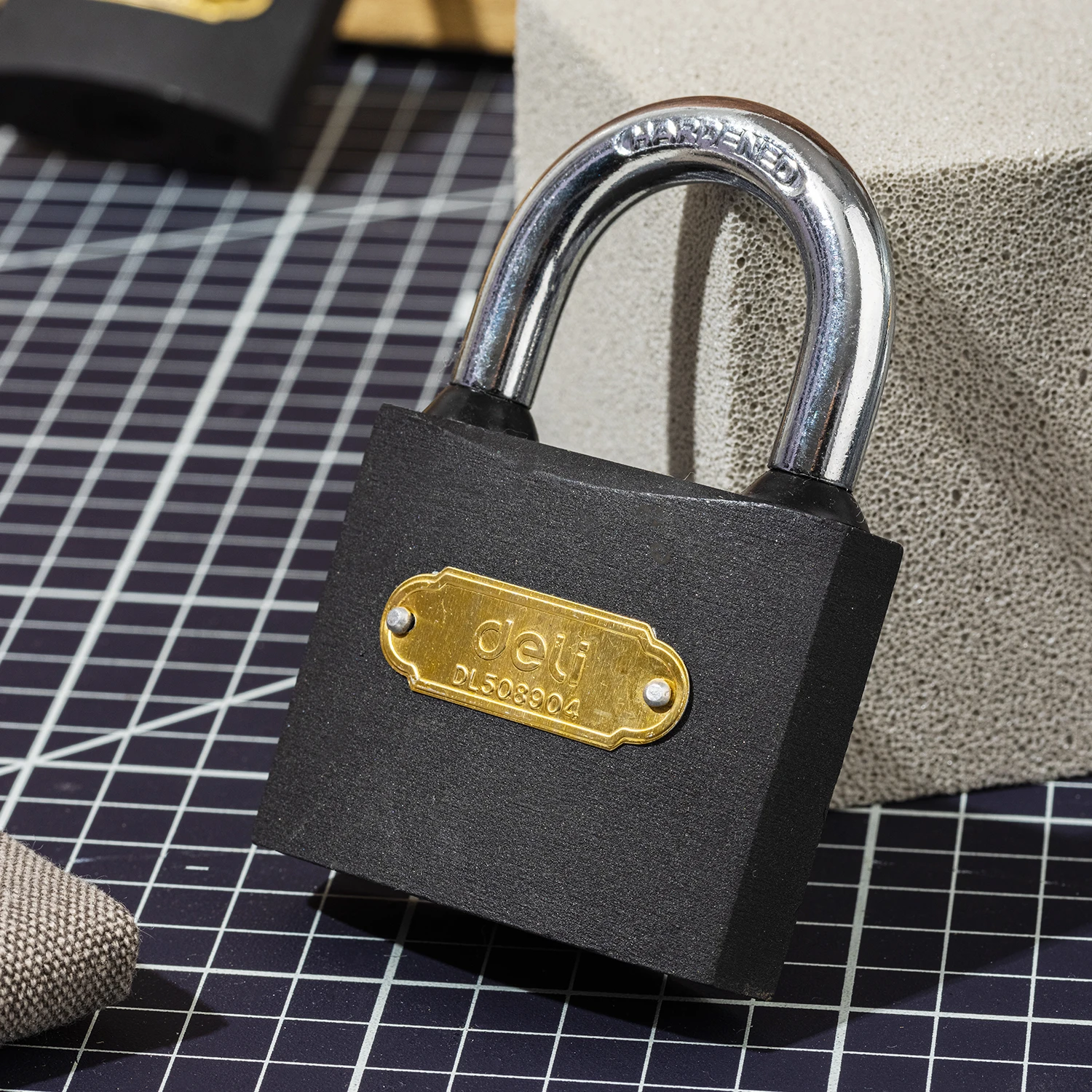 Deli Heavy-Duty Iron Padlock 63mm with Robust Alloy Steel Shackle & Waterproof Keyhole Cover (Black) | EDL508904